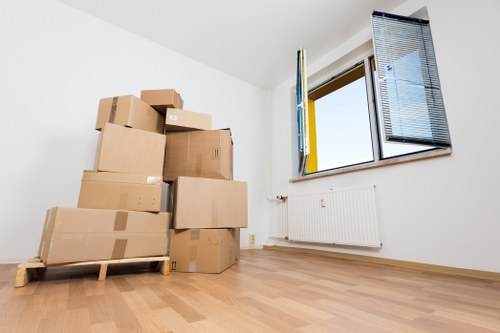 Student removals team preparing boxes and furniture for a move in Dulwich