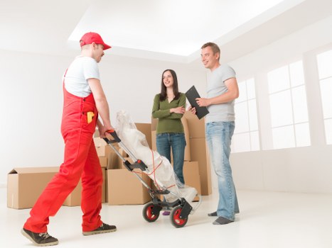 Careful loading of student belongings into a removals van for a Dulwich move