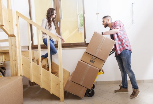Furniture and boxes being transported with a Dulwich removal van