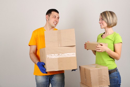 Local team removing sofas and wardrobes from a Dulwich property