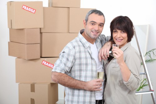 Unpacking service helping a family settle into a new Dulwich property